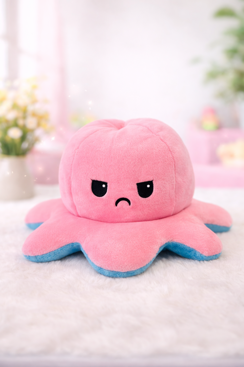 Blue and pink octopus plushies