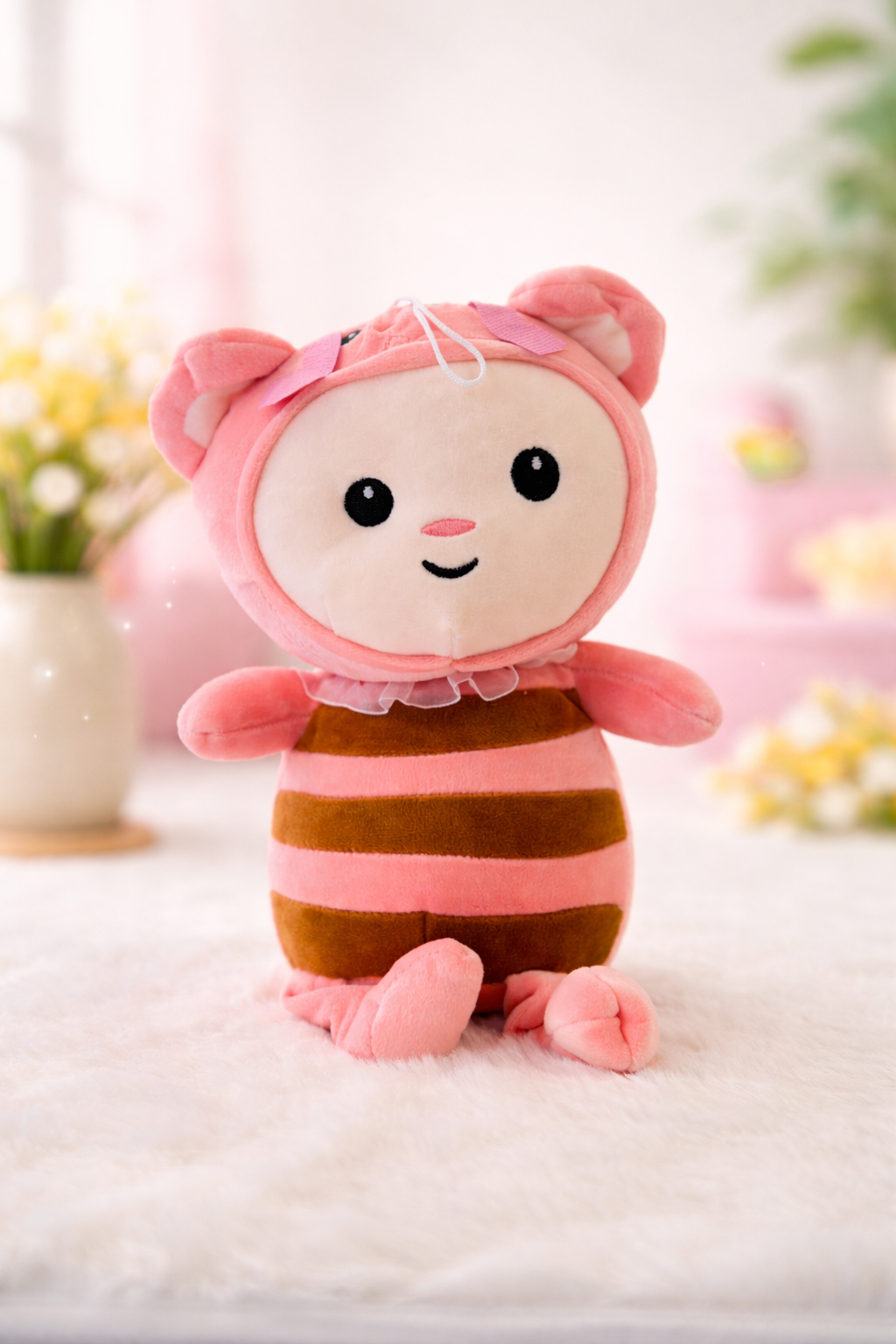 Plush bear in pig costume