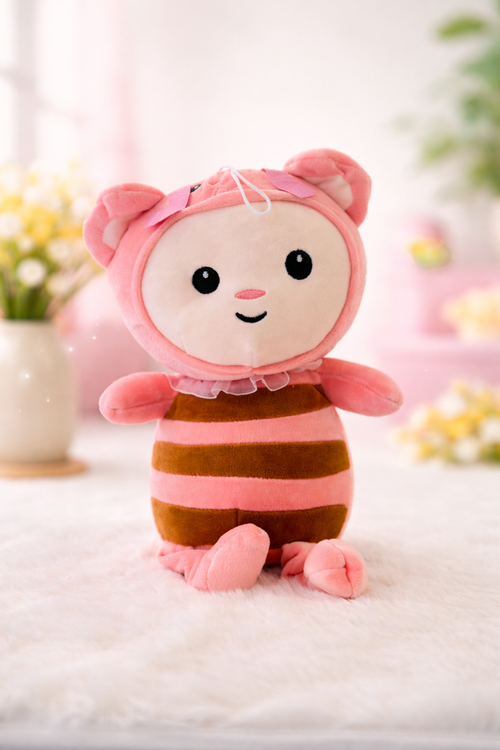 Plush bear in pig costume
