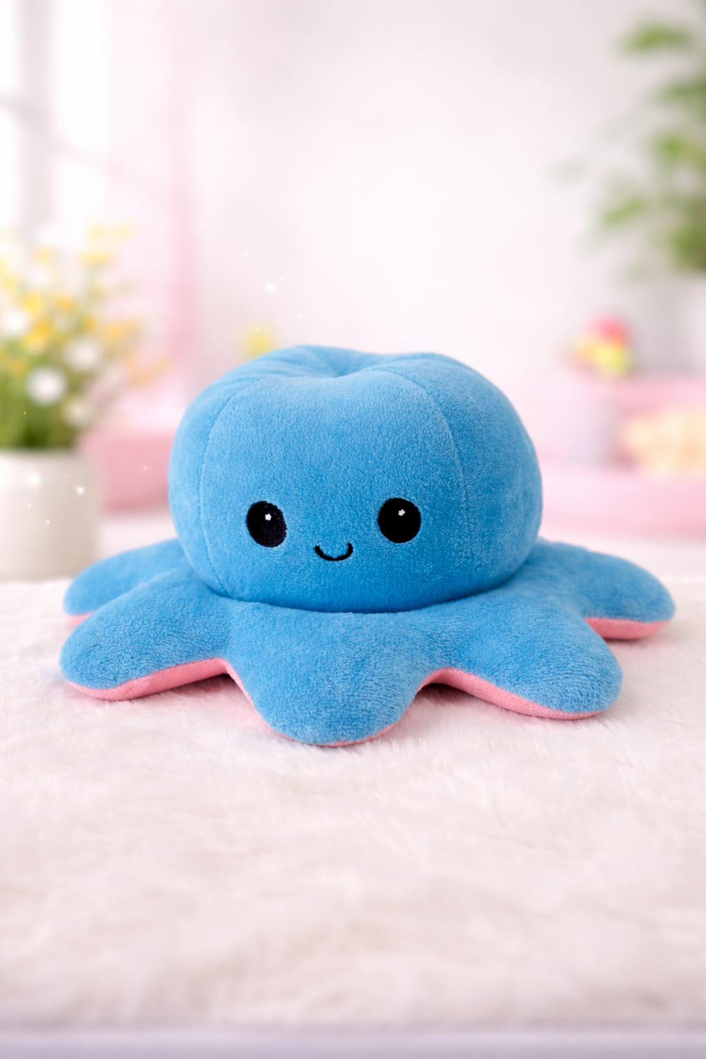 Blue and pink octopus plushies